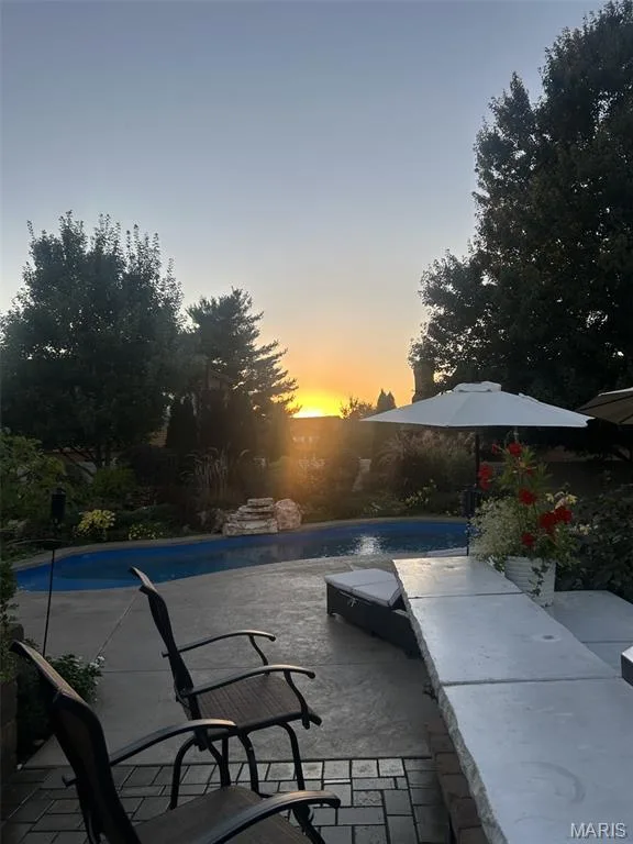 Sunset by the pool — 733 Cedar Glen Drive, Weldon Spring, MO 63304