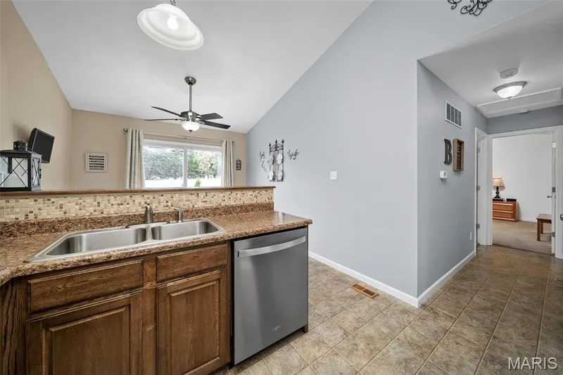 Dishes are always easier when you can look outside. — 17 Belmonte Court, Lake St. Louis, MO 63368