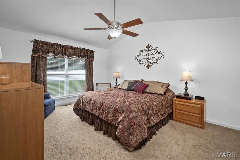 Primary bedroom with vaulted ceilings. — 17 Belmonte Court, Lake St. Louis, MO 63368