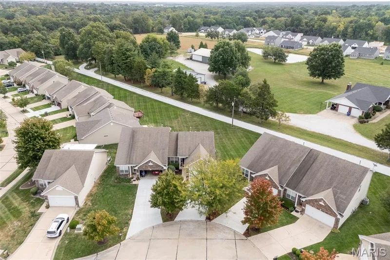 Backs to a private residence behind the fence. — 17 Belmonte Court, Lake St. Louis, MO 63368