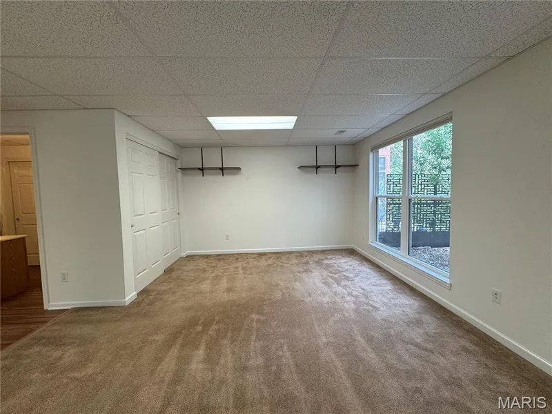 This area with a closet could easily be turned in to Bedroom #3 — 32 Austin Hill Court, Wentzville, MO 63385