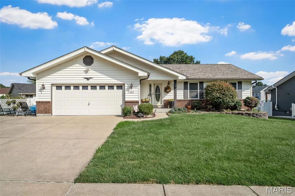 Single-story residence featuring white siding and brick veneer — 355 Birmingham Drive, O'Fallon, MO 63366