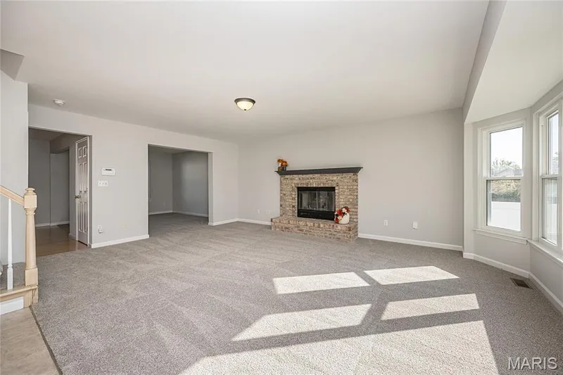 Cozy up near the fireplace in your family room — 117 Black Lantern Trail, St Peters, MO 63376
