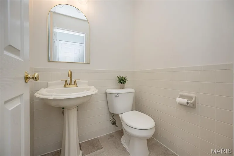 Main floor half bath with new flooring — 117 Black Lantern Trail, St Peters, MO 63376