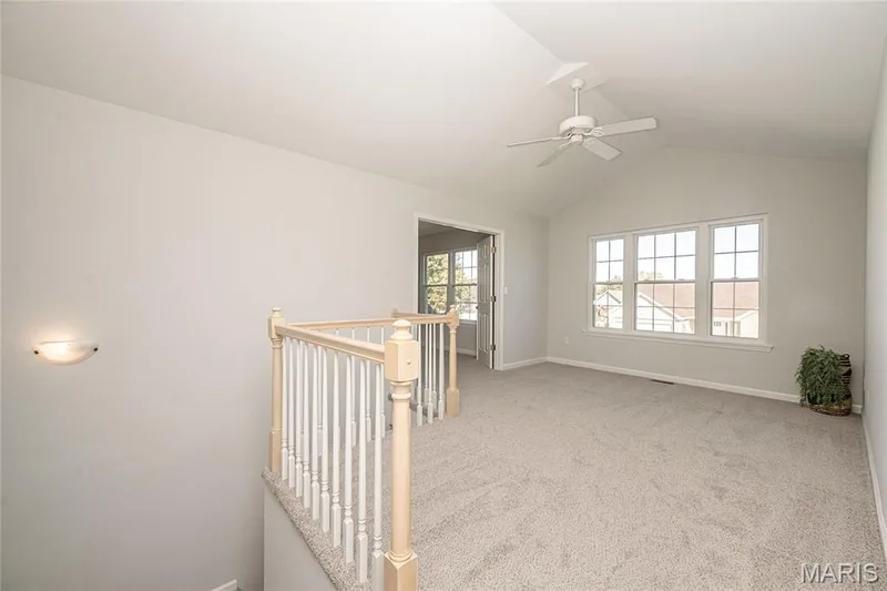 Upstairs loft space is perfect for an office, playroom, library, or whatever you need the flex space for — 117 Black Lantern Trail, St Peters, MO 63376