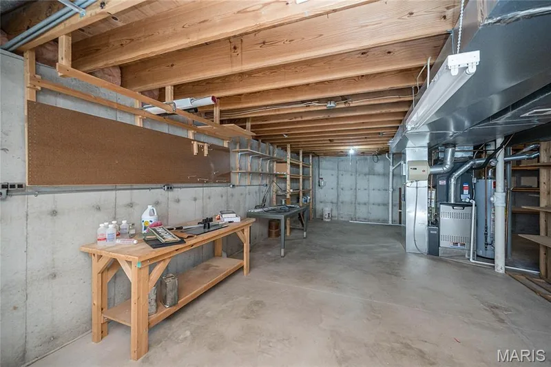 All shelving, work benches and desk stay with the home — 117 Black Lantern Trail, St Peters, MO 63376