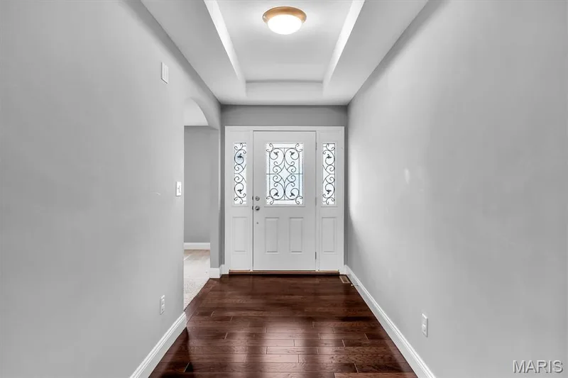Tray ceiling with recessed lighting and a flush mount fixture — 332 Mystic Brook Drive, O'Fallon, MO 63366