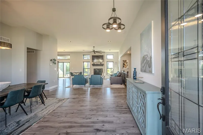 The leaded glass classic craftsman door opens to the drama that lies within. — 121 Eagle Estates Drive, Lake St. Louis, MO 63367