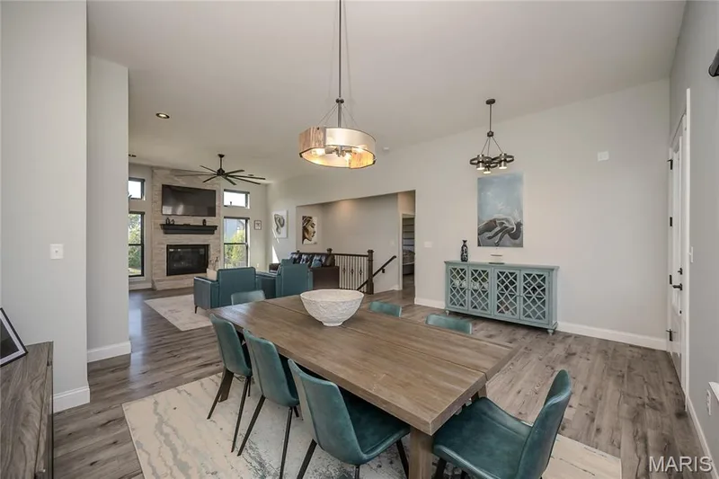 A view from the Dining Area toward the Great Room and primary wing of this home. — 121 Eagle Estates Drive, Lake St. Louis, MO 63367