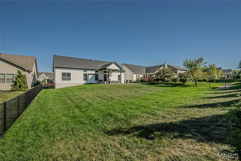 The yard is the perfect grade for a pool or all of your outdoor fun. — 121 Eagle Estates Drive, Lake St. Louis, MO 63367