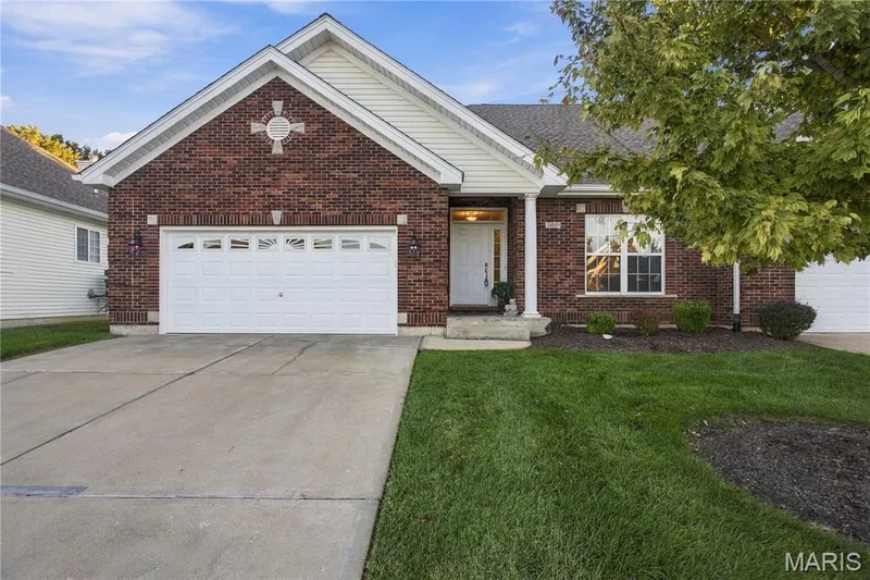 2450 Golden Bear Way #703A, Wentzville, MO 63385 — listing photo 2 of 34