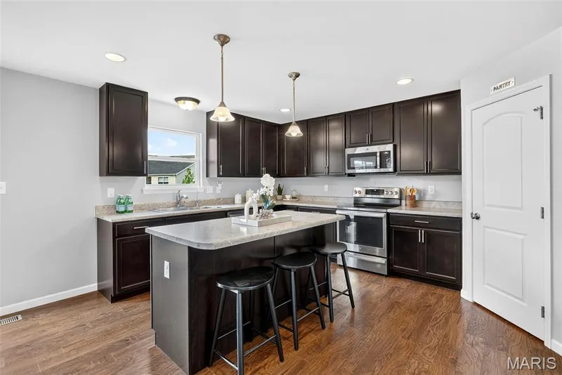 1661 Woods Mill Drive, Wentzville, MO 63385 — listing photo 3 of 48