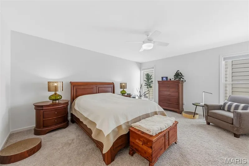 Your own private retreat! This incredibly spacious primary suite offers two generous closets and a private full bath. — 6002 Suntan Drive, St Charles, MO 63301