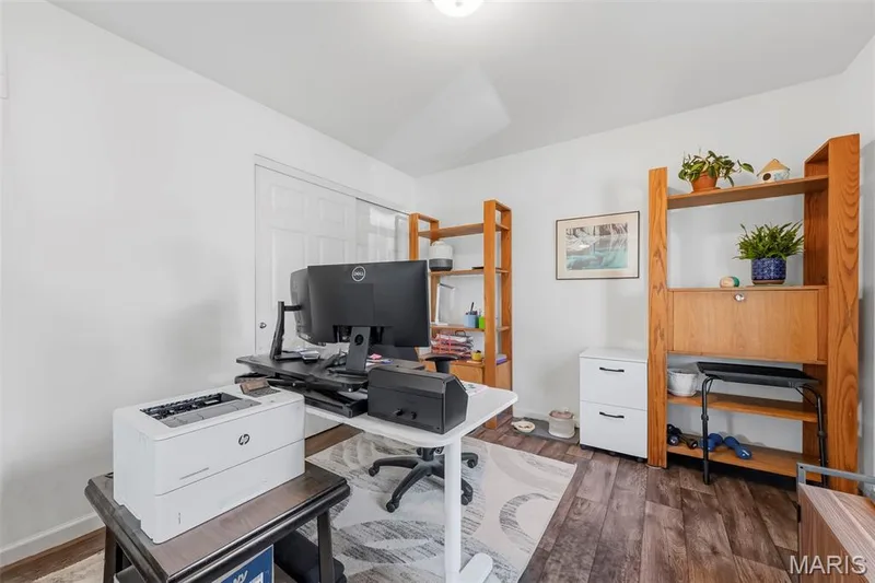 Work from home in style! Beautiful French doors add charm to this versatile space, perfect for a home office, guest room, or third bedroom. — 6002 Suntan Drive, St Charles, MO 63301