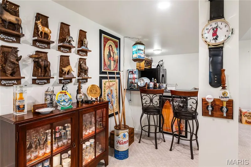 Built-in bar area with a refrigerator, recessed lighting, and an overhead light fixture — 149 Amiot Court, Chesterfield, MO 63146