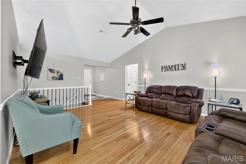 Gorgeous hardwoods in the living room and dining area. — 2335 Federalist Place, O'Fallon, MO 63368