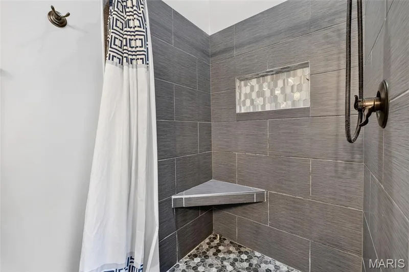 The standing shower is also updated! Check out that tile! — 2335 Federalist Place, O'Fallon, MO 63368