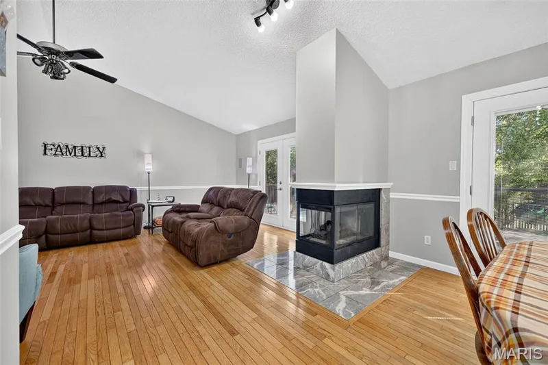 Check out this gorgeous fireplace! Your spot for curling up this fall and winter! — 2335 Federalist Place, O'Fallon, MO 63368