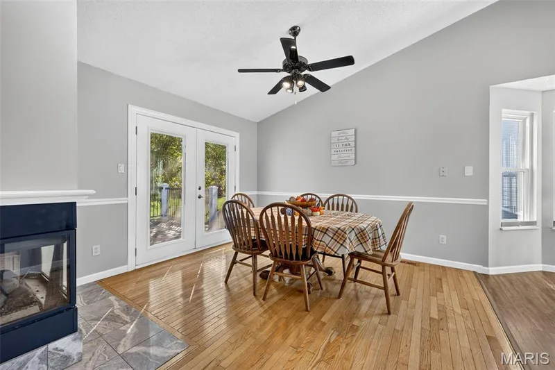 Great space for a dining table near the fireplace, french doors and bay window! — 2335 Federalist Place, O'Fallon, MO 63368