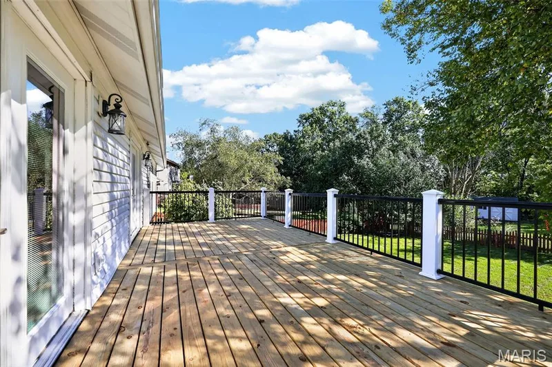 Two doors to the deck make super easy access. — 2335 Federalist Place, O'Fallon, MO 63368
