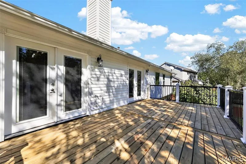 The deck, complete with new decking, is the ultimate outdoor hangout space. — 2335 Federalist Place, O'Fallon, MO 63368