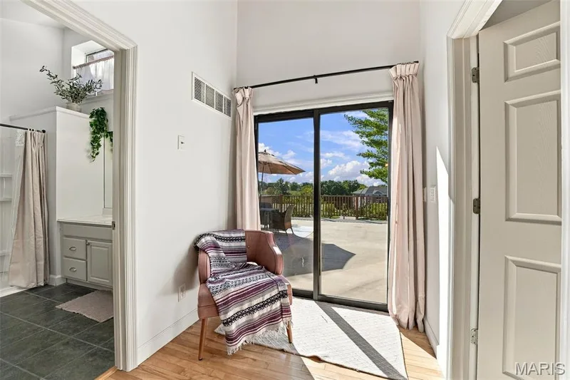 Second story loft with doors to back deck, upstairs bathroom and upstairs bedroom — 103 Hemingway Lane #B, Weldon Spring, MO 63304