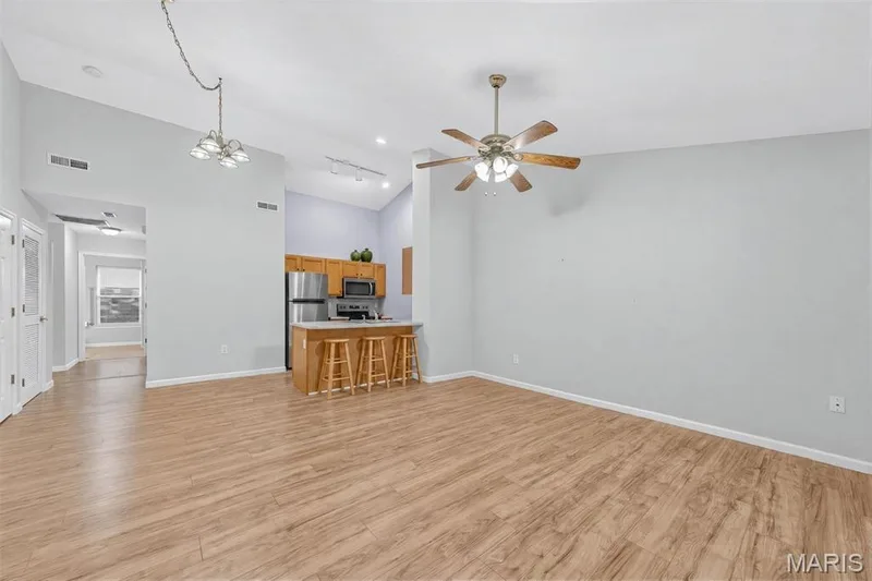 Living Room - Studio Vault Ceilings — 128 Green Gables Drive, Wentzville, MO 63385