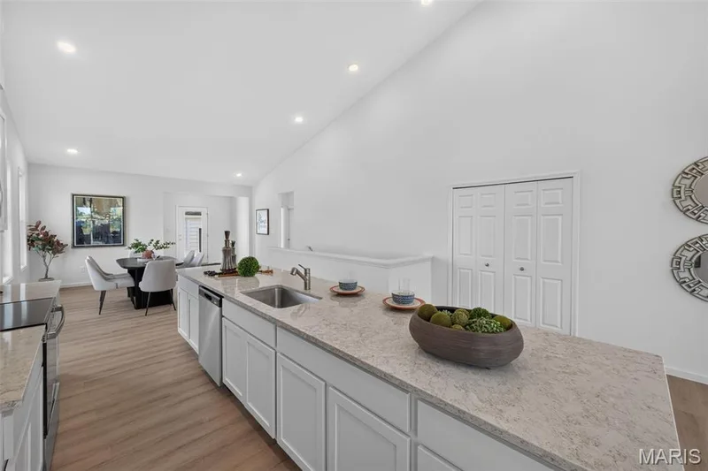Kitchen island with integrated sink and stainless steel dishwasher — 2974 Memphis Street, St Charles, MO 63301