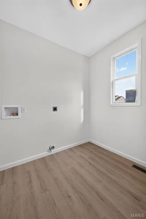 Neutral wall tones with LVP flooring — 2974 Memphis Street, St Charles, MO 63301