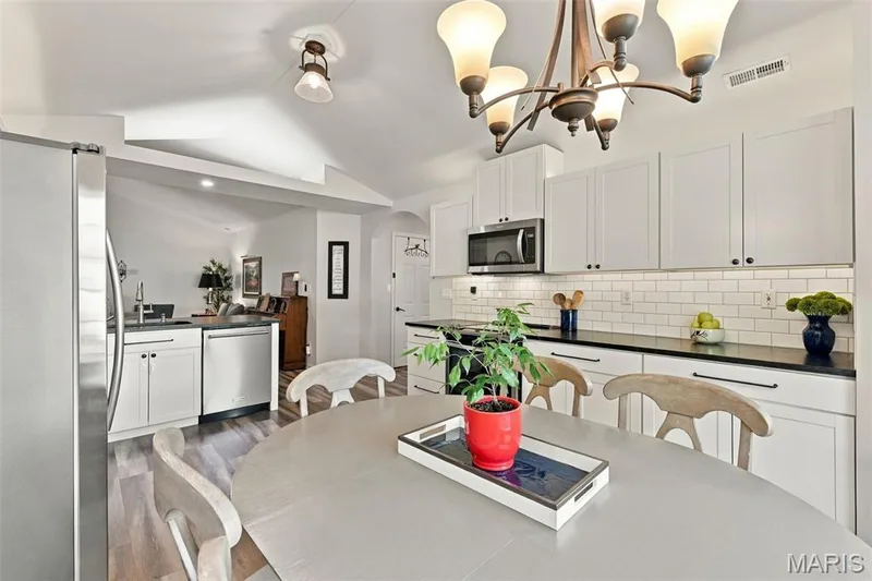 There's plenty of space for gathering around the Table! — 14 Quiet Meadow Court, St Peters, MO 63376
