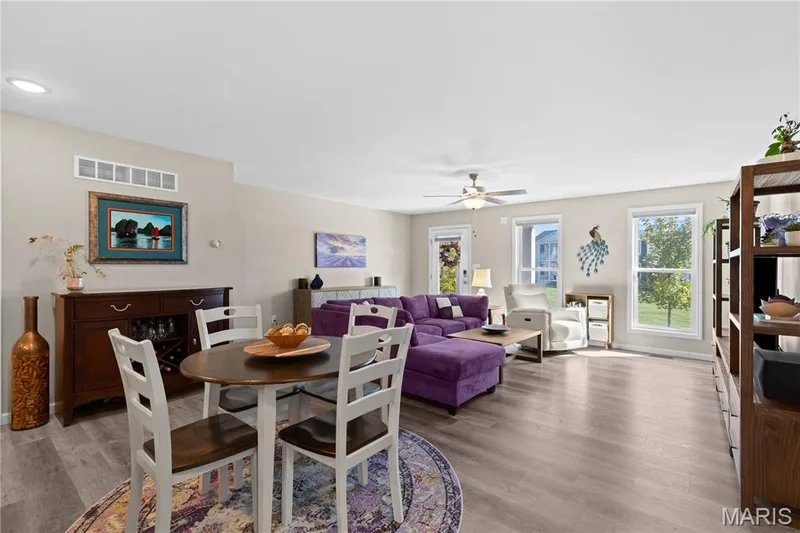 Luxury vinyl plank flooring throughout, recessed lighting, and white trim — 200 Tiber Way, St Charles, MO 63301