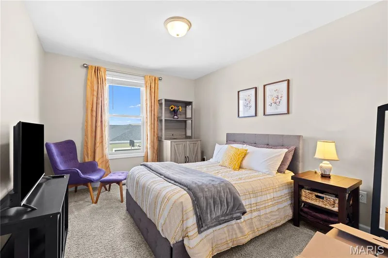 Light-colored carpeting complements neutral wall tones — 200 Tiber Way, St Charles, MO 63301