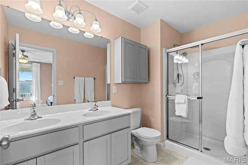 Dual sink vanity with white countertop — 200 Tiber Way, St Charles, MO 63301