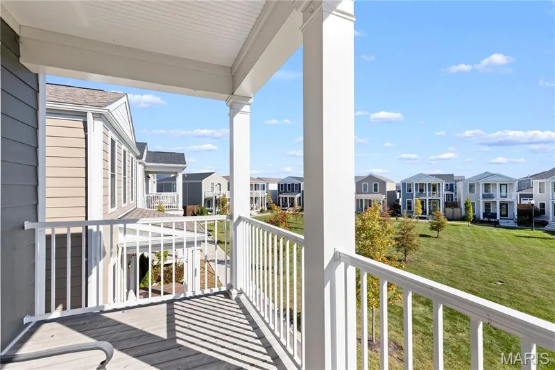 Exterior 2nd-story balcony with white railings — 200 Tiber Way, St Charles, MO 63301