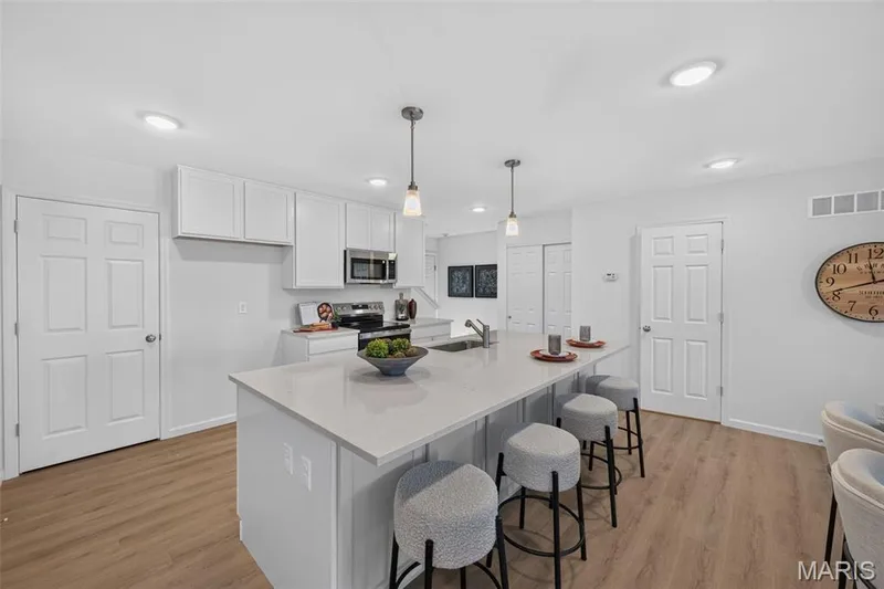 Breakfast bar seating!Beautiful Quartz countertops! — 1760 Dyess Street, St Charles, MO 63301