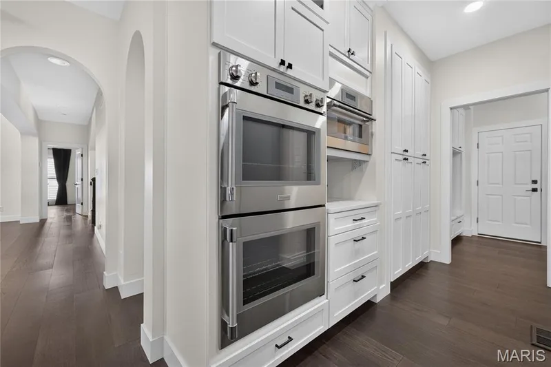 Double French door Thermador ovens and microwave — 713 High Point Drive, Lake St. Louis, MO 63367