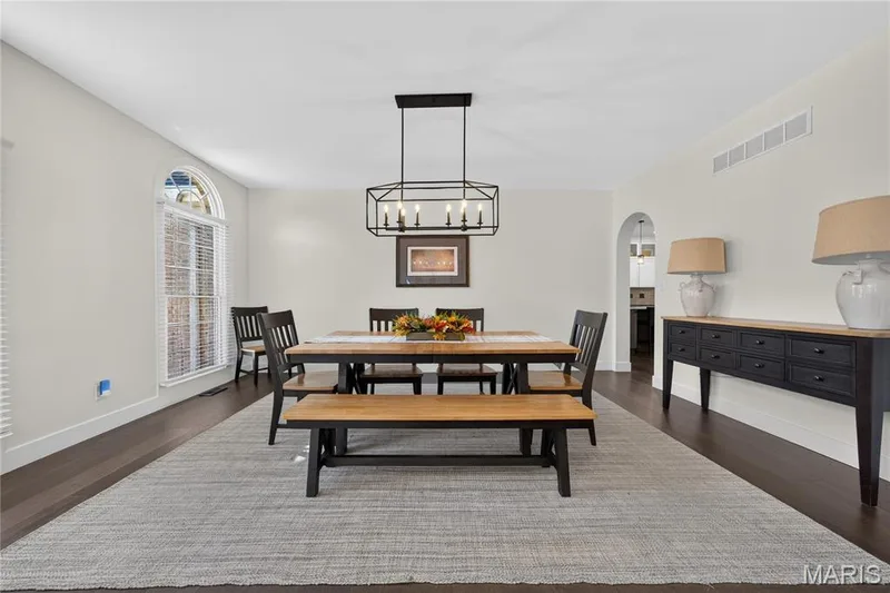 Formal dining room with hardwood — 713 High Point Drive, Lake St. Louis, MO 63367