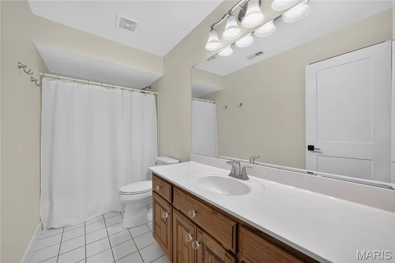 Upper level bathroom — 713 High Point Drive, Lake St. Louis, MO 63367