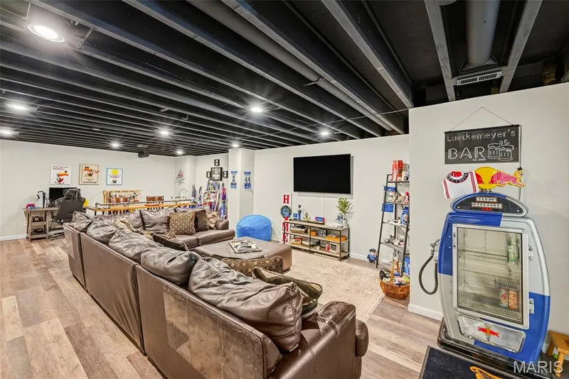 Huge family room/rec room in lower level - perfect for game night or family movies! — 101 Starry Night Way, St Charles, MO 63301