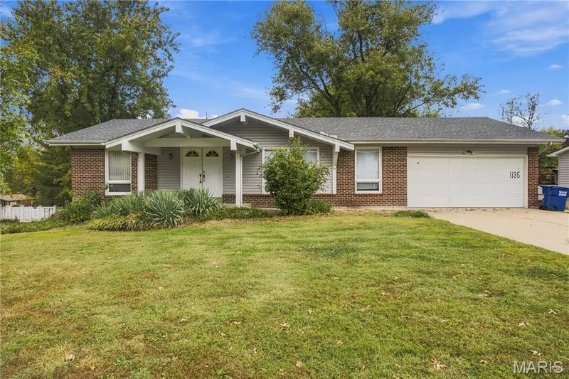 1135 Grand Prix Drive, St Charles, MO — listing photo 1