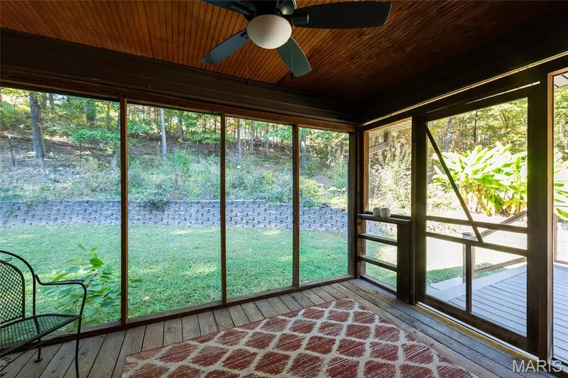Screened in porch overlooking back yard — 1319 Timber Terra Road, Wildwood, MO 63021