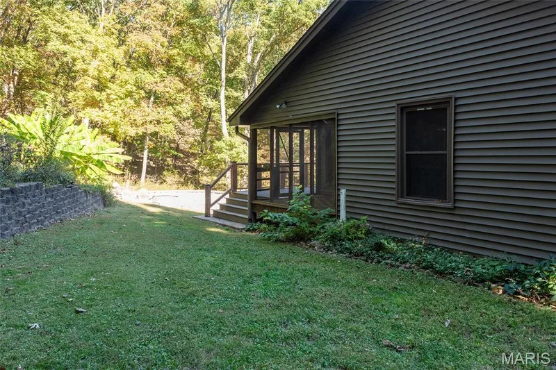 View of screened porch toward back yard — 1319 Timber Terra Road, Wildwood, MO 63021