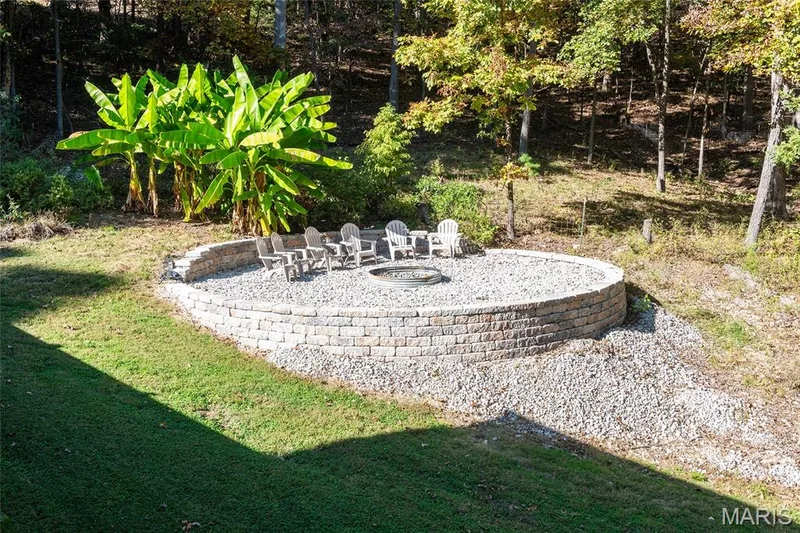 Amazing stone firepit in back yard — 1319 Timber Terra Road, Wildwood, MO 63021