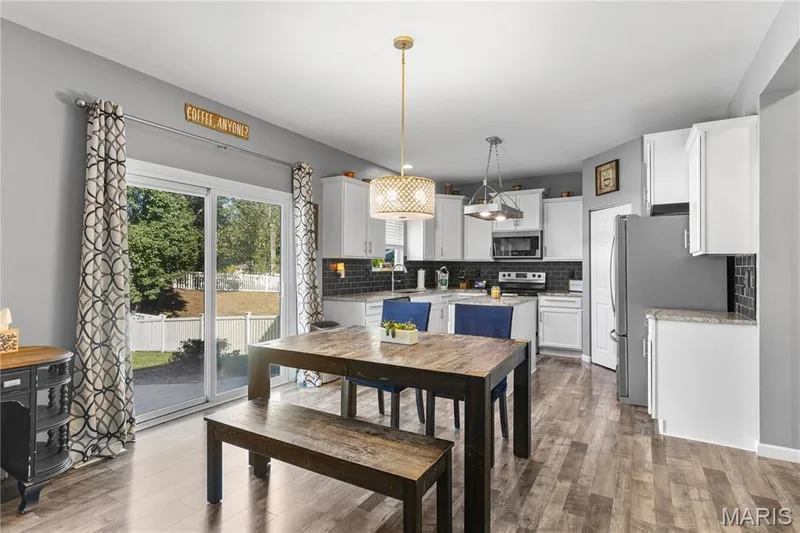Light & bright Dining area is the center of the main level & the heart of the home! — 2542 Amber Willow Court, Lake St. Louis, MO 63367