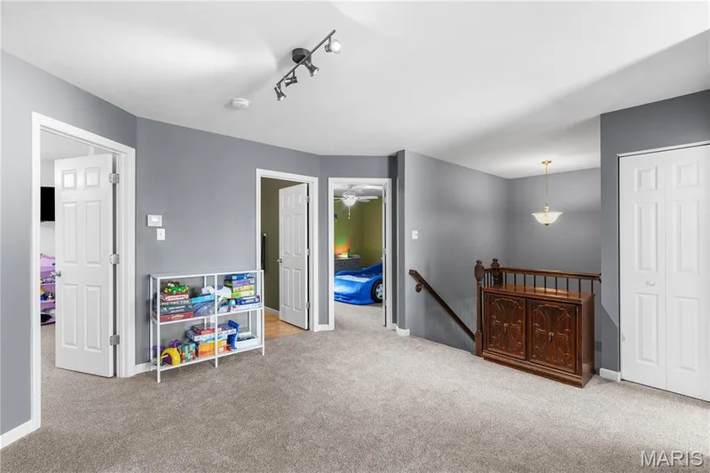 Fresh carpet in upper level! Huge space for a game room or bonus room! — 2542 Amber Willow Court, Lake St. Louis, MO 63367