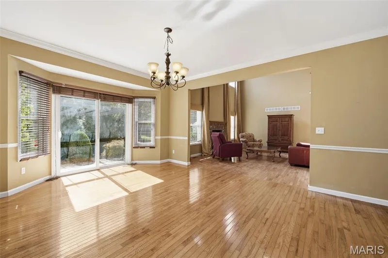 Looking into the great room from the kitchen/breakfast room. — 1615 Wainscott Court, O'Fallon, MO 63366