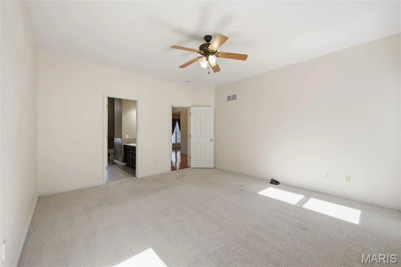 Main floor primary bedroom. — 1615 Wainscott Court, O'Fallon, MO 63366
