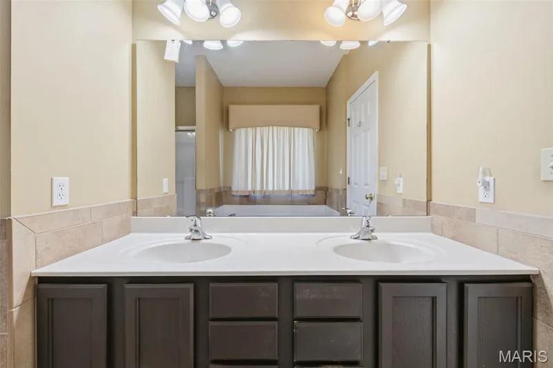 Main floor primary bedroom vanity. — 1615 Wainscott Court, O'Fallon, MO 63366