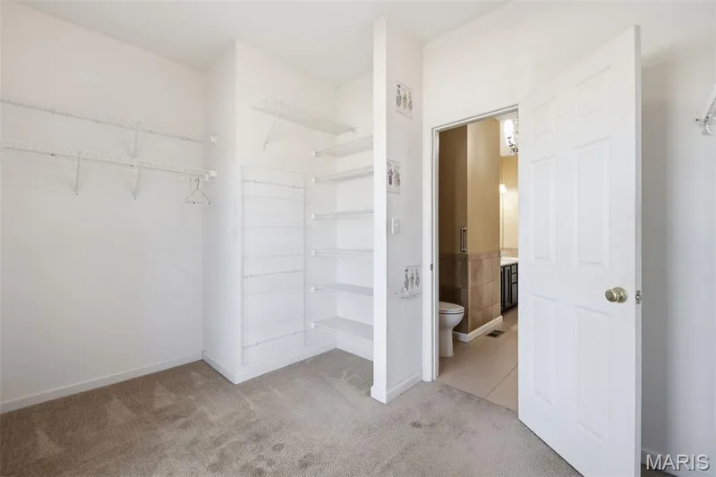 Another view of the primary bedroom walk in closet. — 1615 Wainscott Court, O'Fallon, MO 63366