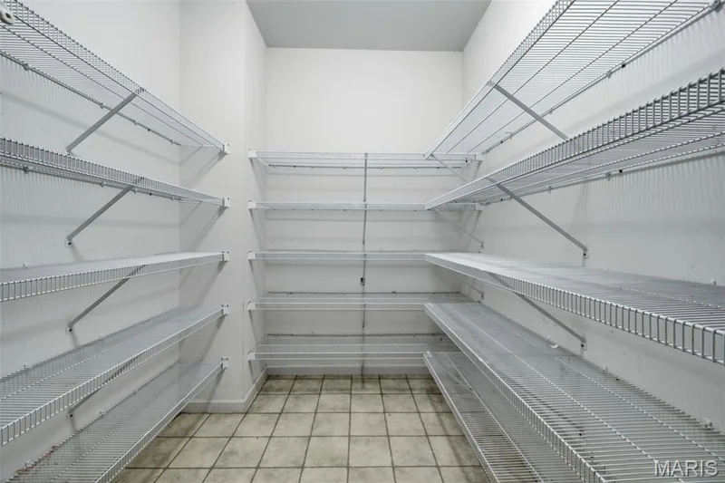 Walk in kitchen pantry. — 1615 Wainscott Court, O'Fallon, MO 63366